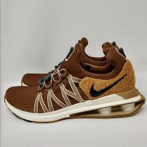 nike shox gravity elemental gold